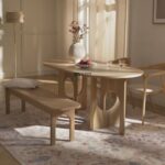 Oval Solid Wood Dining Table with Sculptural Cutout Legs
